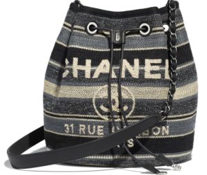 Bolsa con cordón en tela y piel de ternera