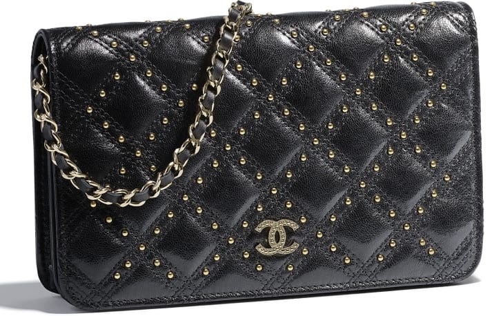 cartera chanel de mano con cadena