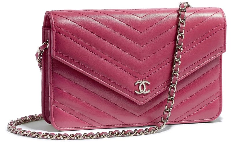 cartera chanel rosa con cadena
