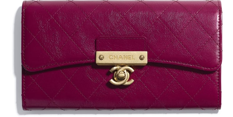 cartera chanel violeta con solapa